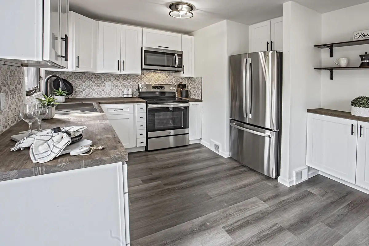 Remodeled kitchen with stainless steel appliances.