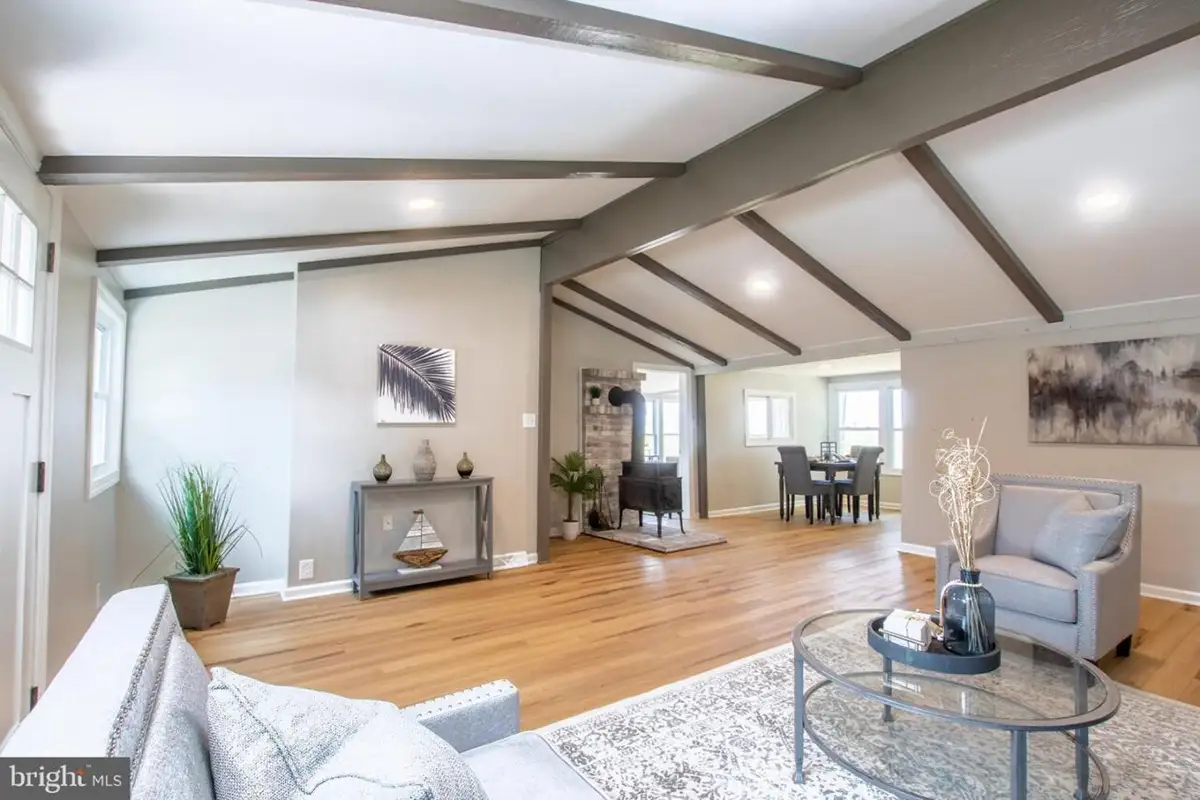 Living room with ceiling beams.