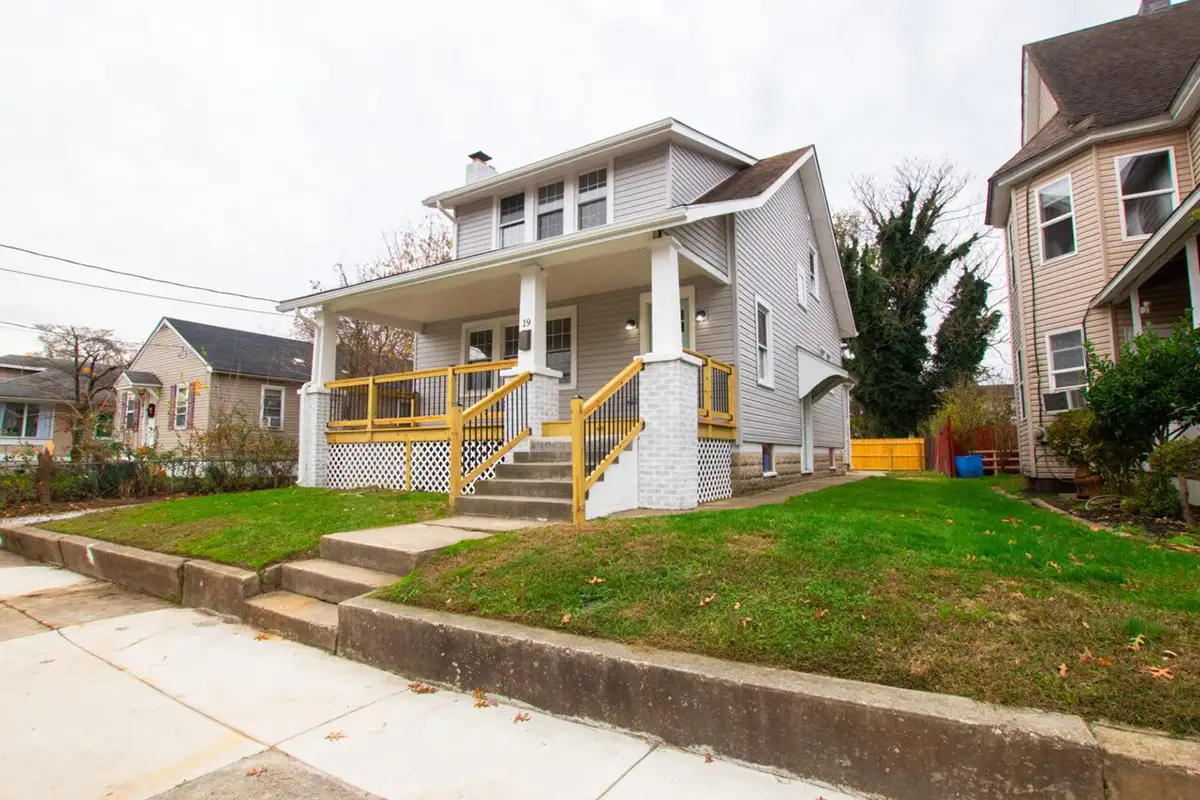 Front of a refreshed craftman house.