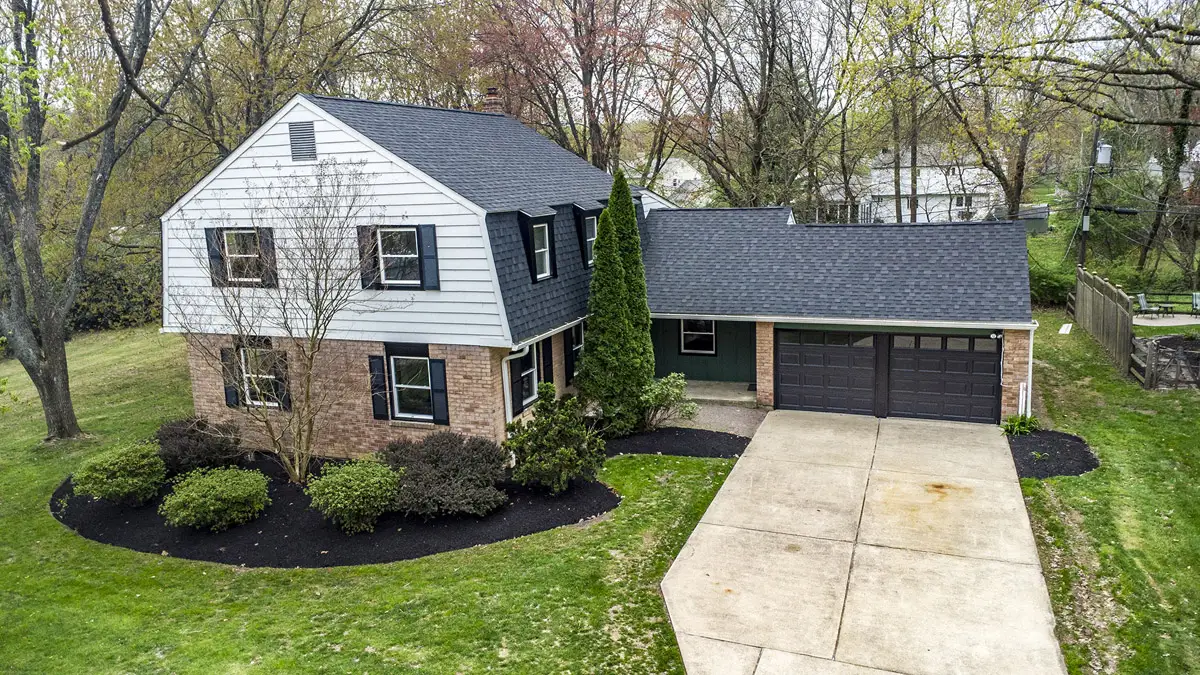 Outside view of Dutch colonial style home.