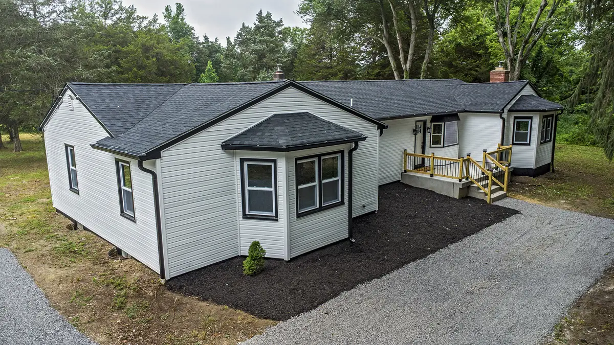 Aerial view of front of revamped house.
