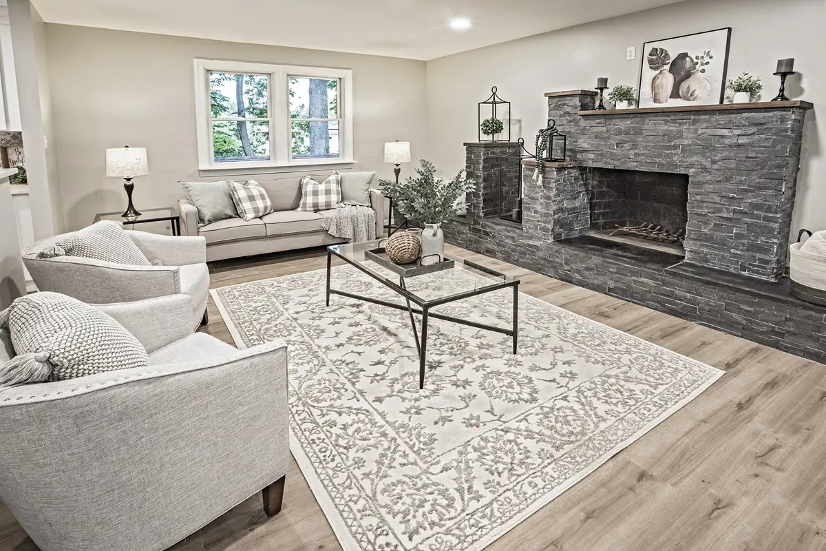 Living room with large fireplace.